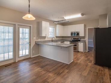 white-and-brown-kitchen-island-3958947