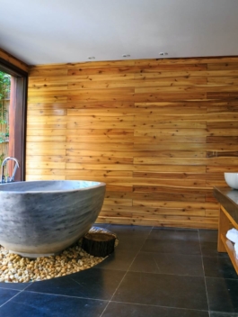 round-white-and-gray-ceramic-bathtub-inside-brown-room-2134224